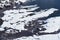 Benasque frozen reservoir Paso Nuevo in Pyrenees