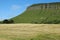 Benbulben Mountain, County Sligo, Ireland on summer day against backdrop of blue sky