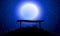 Bench against the moon sky