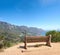 Bench with a beautiful view of Table Mountain and sea against a clear blue sky background with copy space. Relaxing spot