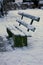 Bench covered in snow