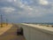 Bench on empty seaside promenade