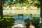 Bench at a fishing spot at a pond at Blue Spruce Park