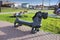 Bench in the form of a dachshund dog in the park in Yuzhno-Kurilsk city, Kunashir Island, Russia