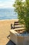 Bench on Kvarner gulf coastline on sunny summer day