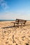 Bench on a lonesome beach of the Baltic Sea