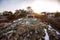 Bench on Marginal Way path at sunset in Ogunquit Maine during winter