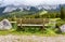 Bench near Almsee lake in the Alps mountains - Tyrol, Austria