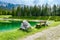 Bench near Almsee lake in the Alps mountains - Tyrol, Austria