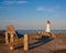 Bench And Peggys Cove Lighthouse