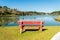 A bench at Sao Bernardo Lake - popular tourist destination in Sao Francisco de Paula, Brazil