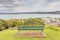 Bench seat overlooking beach and sea in New Zealand.