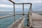 A bench seat on the Port Noarlunga Jetty with selective blue and