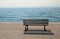 bench on the shore with the placid water symbol of tranquility a