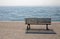 bench on the shore with the water symbol of tranquility and expe