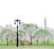 Bench and streetlight in park over city background.