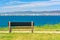 bench on the sunny beach shore.