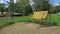 Bench swing in front of the pond on the estate