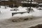 Bench under snow at Campus Mall in Madison Wisconsin