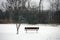 Bench under snow in Michigan cold winter lonely sad