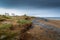 Bench view of storm coming in over Northam Burrows, North Devon, UK.