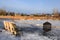 Bench and warming station for an outdoor ie hockey arena