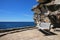 Bench and weathered rock near Bondi Beach