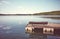 Bench on a wooden floating pier, color toning applied, Lipie Lake in Dlugie Village, Poland