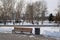 Bench and Yekaterinburg citiscape to Iset tower in winter
