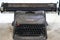 Benched steel Olivetti brand old school typewriter