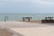 Benches on the boardwalk square in front of atlantic beach in Saint Vincent sur jard in VendÃ©e France