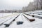 Benches covered with snow at the old stadium