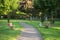 Benches in an empty park in the evening.