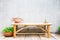 Benches are made of dried bamboo, with flower pots and loft-style cement walls.