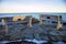 Benches on Marginal Way path along the rocky coast of Maine in Ogunquit during winter