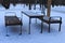 Benches for relaxation and a table in a city park. Moscow. Russia.