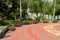 Benches stand in a semicircle in a city park