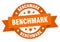 benchmark round ribbon isolated label. benchmark sign.