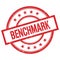 BENCHMARK text written on red vintage round stamp