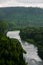 Bend of the mountain river in woodland in Siberia