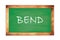 BEND text written on green school board