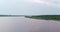 Bend of Volga river aerial view from flying quadcopter over forest.