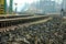 Bending railway with hundreds of pebbles.