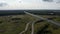 Bends of the highway laid among the dense forest