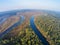 The bends of the river Mologa, morning view from the air.