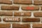 Benefits of agile symbol. Concept words Benefits of agile on beautiful brown brick. Beautiful brown brick wall background.