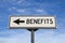 Benefits white road sign with arrow, arrow on blue sky background