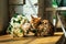 Bengal kitten smelling bouquet of flowers by window