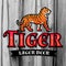 Bengal Tiger Beer logo vector. Lager Label design template. Predator insignia, Sport team logotype on wood texture