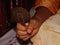 Bengali Hindu groom holding Darpan or Mirror in his hand at the time of wedding in Bangladesh. Selective focus